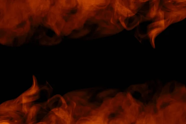神秘的なオレンジ色のタバコの蒸気パターンは 黒い背景に炎が閉じ込められているように見えますデザインのためのエキサイティングな抽象オブジェクト — ストック写真