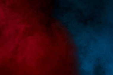 Siyah arka planda kırmızı ve mavi buhar bulutu güzel ve gizemli soyutlama konsepti sigara ve bağımlılık