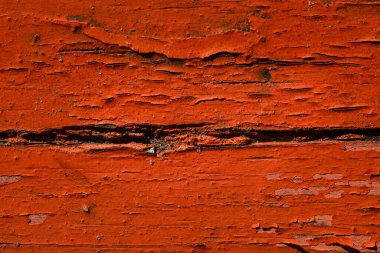 parlak grunge ahşap doku turuncu çatlamış boya ile kaplı tasarım için yakın plan