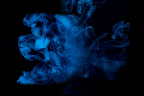 蓝色异形图案迷住了香烟蒸气的蓝色云彩设计理念吸烟 — 图库照片