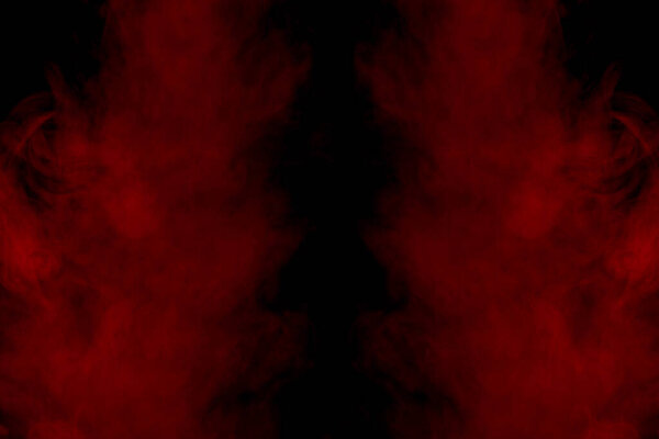 Red clouds of cigarette vapor formed a mysterious mystical pattern on a dark background charming atmosphere abstraction for design