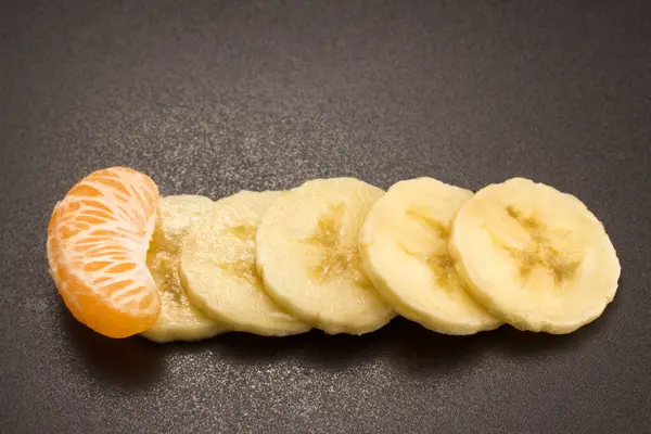 Slice Mandarin Stands Out Pieces Banana — Stock Photo, Image