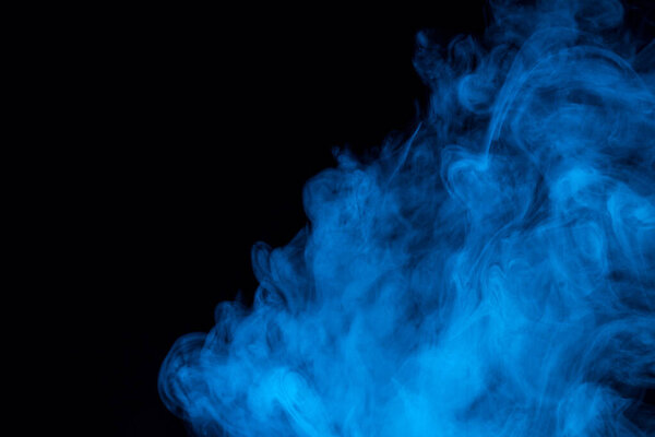 Cloud of mysterious and thick blue pair on a dark background mystical abstraction Background for design