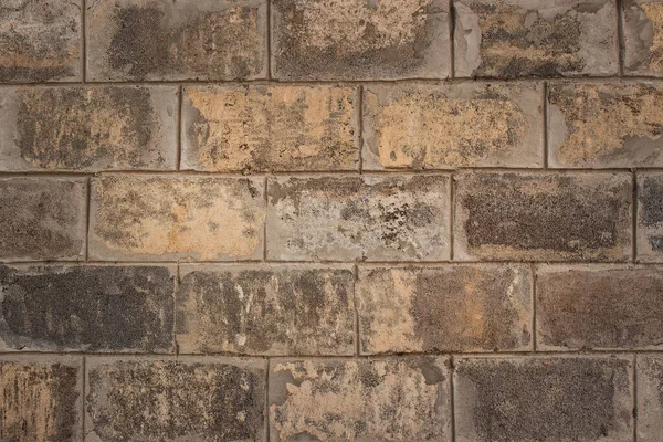 Faktura Wielobarwnej Kamiennej Ściany Wyłożonej Betonowymi Klockami Tło Dla Architektury — Zdjęcie stockowe