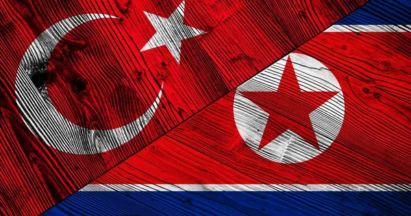 Houten Achtergrond Van Decoratieve Kleurrijke Vlaggen Van Turkije Noord Korea — Stockfoto