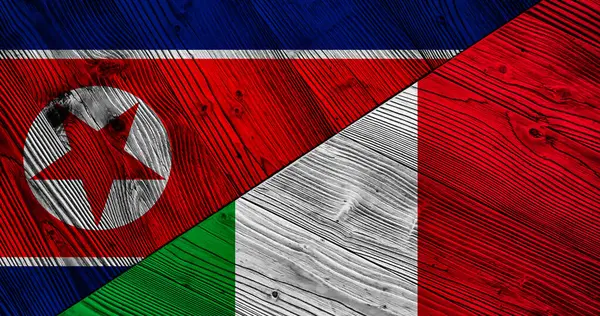 朝鲜和意大利装饰彩旗的木制背景 — 图库照片