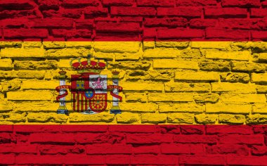 İspanya 'nın dekoratif renkli bayrağının tuğla duvar arka planı