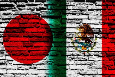 Tuğla duvarda Japon ve Meksika bayrakları