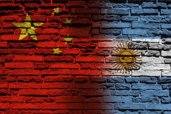Flaggor Kina Och Argentina Tegelväggen — Stockfoto