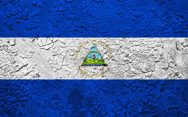 ニカラグアの装飾的なカラフルな旗の古い壁の背景 — ストック写真