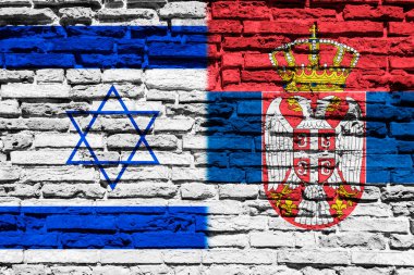 Tuğla duvarda İsrail ve Sırbistan bayrakları