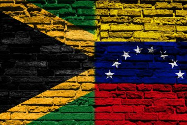 Jamaika ve Venezuela bayrakları tuğla duvarda