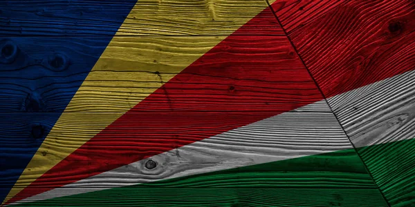 木制木板上的塞舌尔国旗 — 图库照片