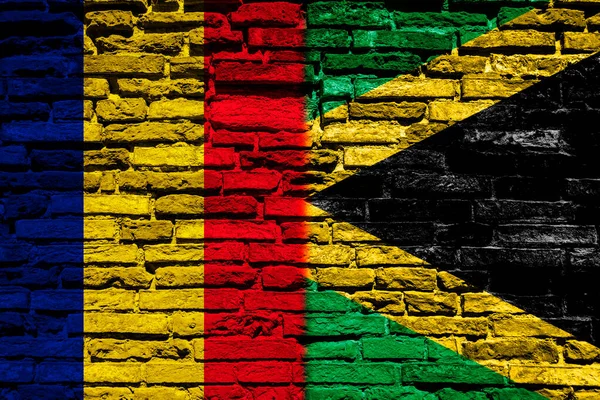 Duvarda Ciad Jamaika Bayrakları — Stok fotoğraf