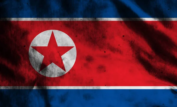 古い生地に北朝鮮の旗 — ストック写真