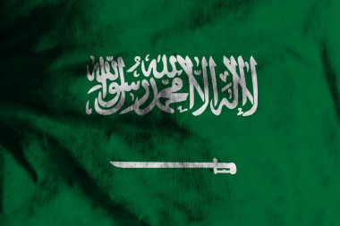 Eski kumaş üzerinde Suudi Arabistan bayrağı