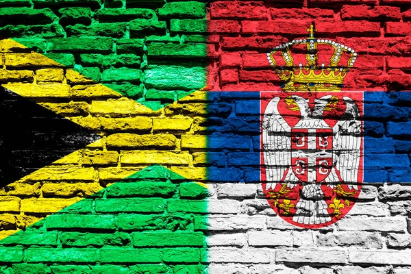 Flags Jamaica Serbia Brick Wall — Stock Photo, Image