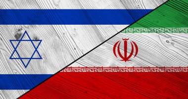 Tahta tahtada İsrail ve İran bayrakları