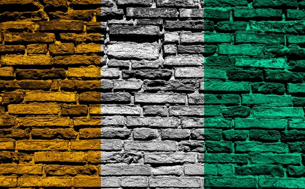 Pobřežní Vlajka Slonoviny Cihlové Stěně — Stock fotografie