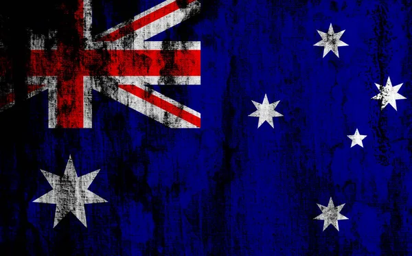 Australian flag on old torn fabric