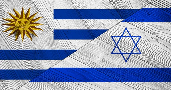 木製の板の上にウルグアイとイスラエルの旗 — ストック写真