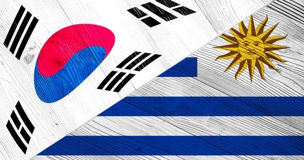 Sydkoreas Och Uruguays Flaggor Träplankor — Stockfoto