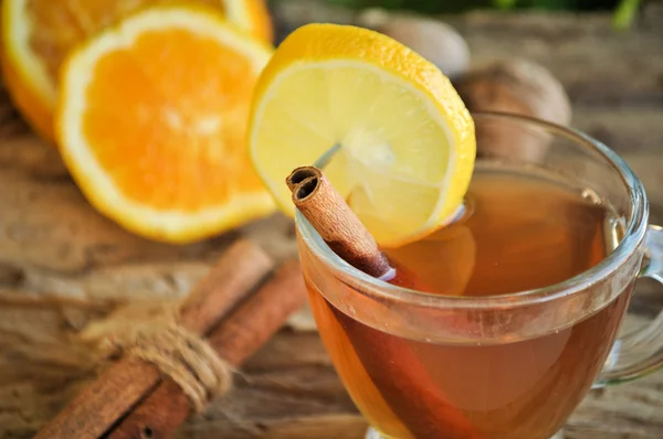 Hot wine for winter and Christmas with delicious orange and spices — Stock Photo, Image