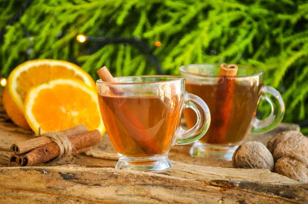 Hot wine for winter and Christmas with delicious orange and spices — Stock Photo, Image