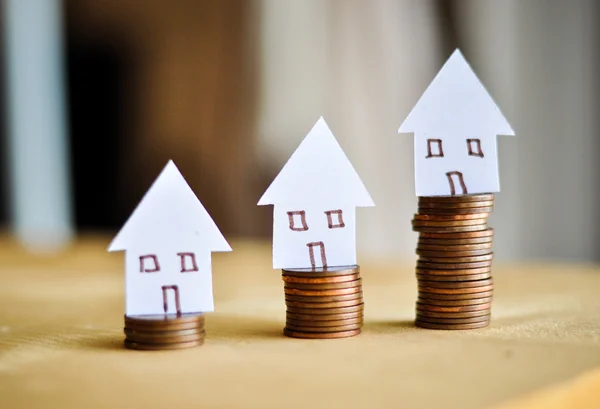 Mortgage concept by money house from the coins — Stock Photo, Image