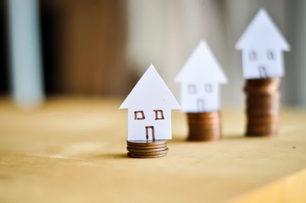 Mortgage concept by money house from the coins — Stock Photo, Image