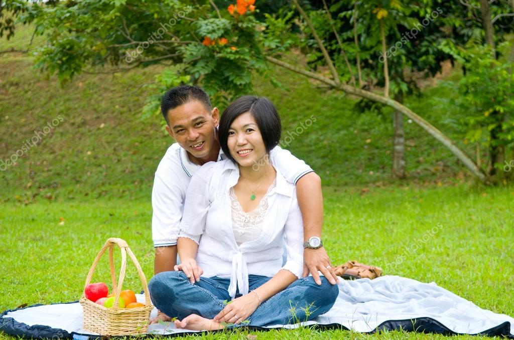 Outdoor young asian couple