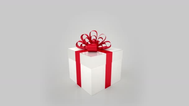 white gift box with red bow opening