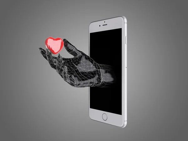 Mão segurar o coração vermelho fora de um telefone inteligente . — Fotografia de Stock
