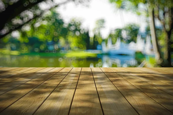 Perspektif ahşap ve bokeh arka plan ışık