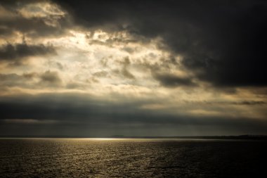 Sea water clouds evening