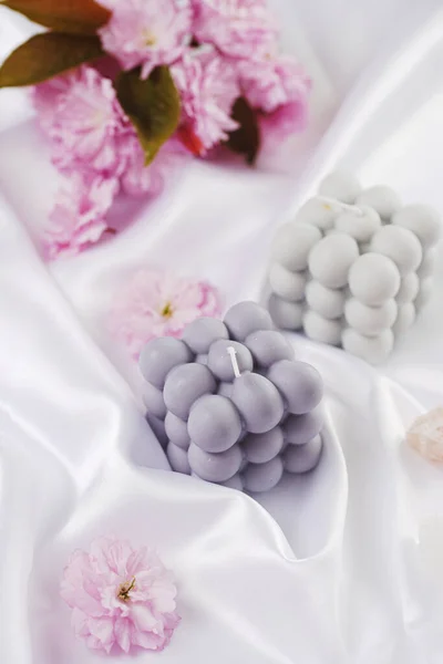 Grey Blue Bubble Candle White Silky Fabric Pink Cherry Blossom — Stock Photo, Image