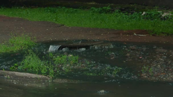 Outflow of water from a well. Breakthrough of the water supply system. Sewerage. prores 422, bmpcc4k — Stock Video