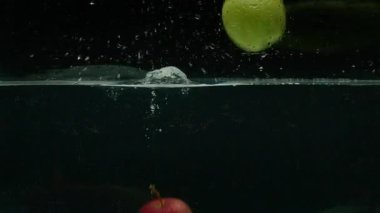 Elma suya dalıyor, ağır çekim, prores 422, bmpc4k