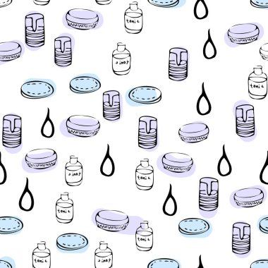 Kozmetik kremi, göz farı, yüz pudrası, fırça, temel kremi, beyaz arka planda rimel üzerine büyük karalamalar.