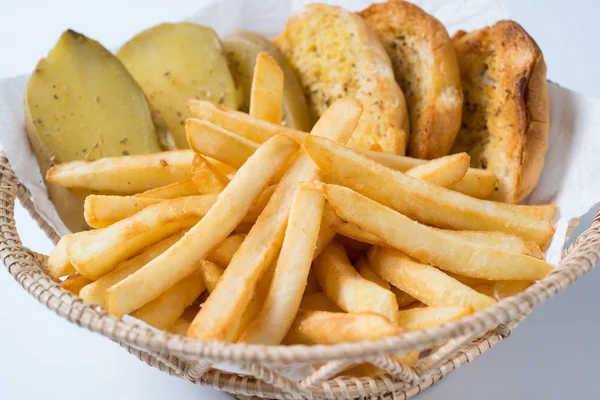 French fries in a Basket on white background — Stock Photo, Image