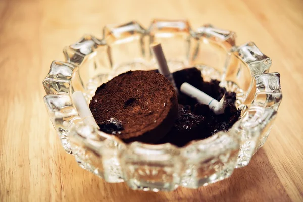 Ashtray cigarette from coffee grounds