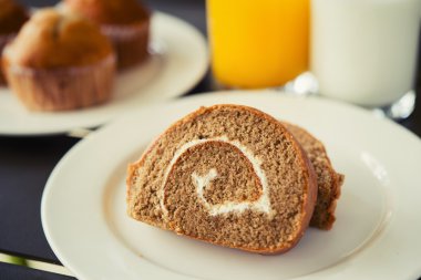 Sweets jam roll Orange juice and milk fresh