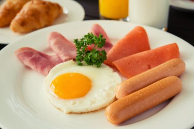 Ham breakfast served with coffe