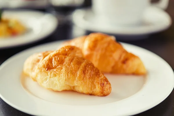 Croissant Breakfast served with black coffee — Stock Photo, Image