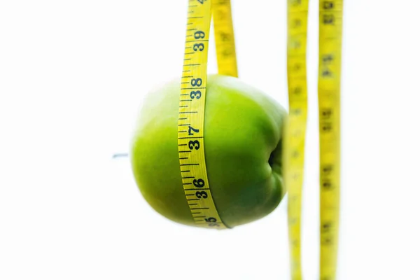 Metre tarafından sarılmış bir elma