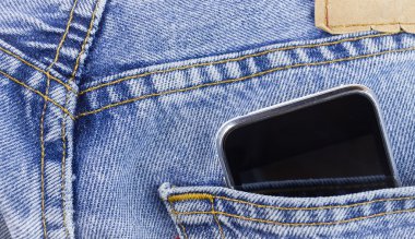 Smartphone in the pocket jeans