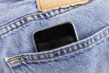 Smartphone in the pocket jeans
