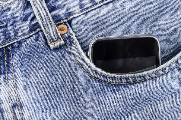 Smartphone in the pocket jeans