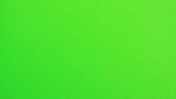 Разноцветные звёзды на зелёном экране — стоковое видео
