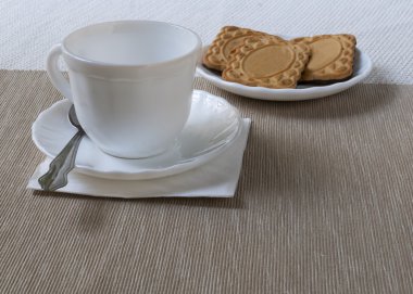 çay Kupası ve çerezler ile fincan tabağı